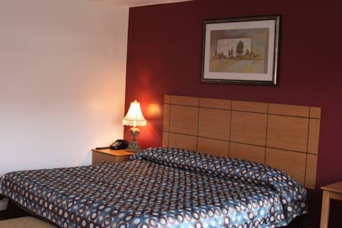 Imagen de la habitación del Hotel New Relax Inn. Foto 5