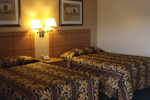 Imagen de la habitación del Hotel New Relax Inn. Foto 15
