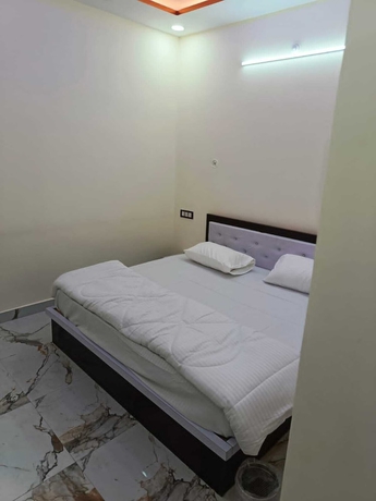 Imagen de la habitación del Hotel New Residency Palace. Foto 7