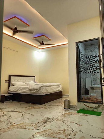 Imagen de la habitación del Hotel New Residency Palace. Foto 12