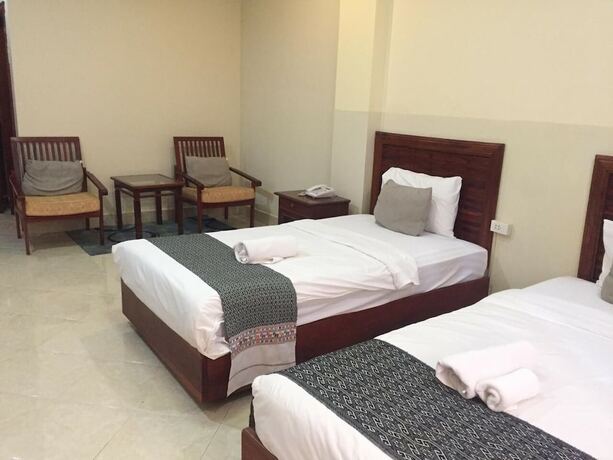 Imagen de la habitación del Hotel New Rose Boutique. Foto 14