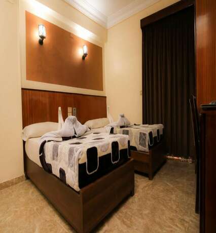 Imagen de la habitación del Hotel New Saint Catherin. Foto 13