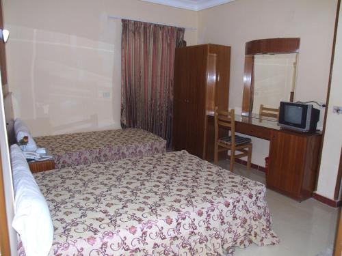 Imagen de la habitación del Hotel New Saint Catherine. Foto 15