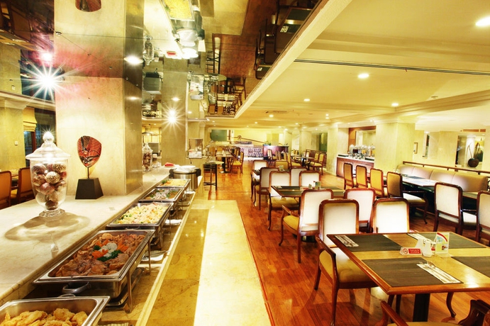 Imagen del bar/restaurante del Hotel New Saphir Yogyakarta. Foto 3