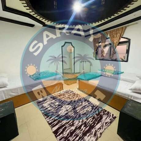 Imagen de la habitación del Hotel New Saraya Camp. Foto 14