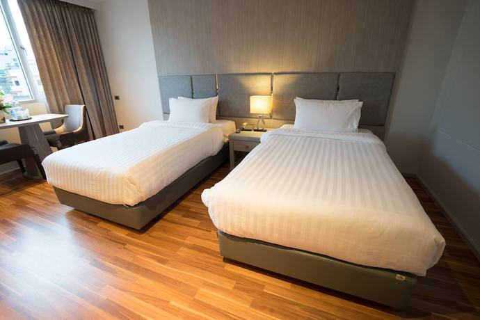 Imagen de la habitación del Hotel New Season Square. Foto 16