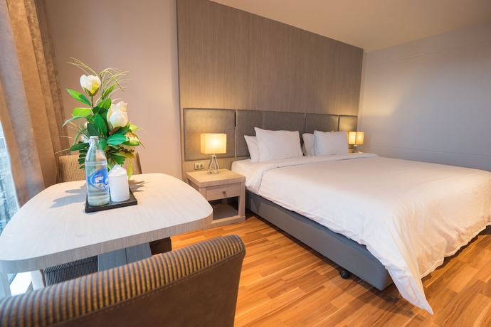 Imagen de la habitación del Hotel New Season Square. Foto 17