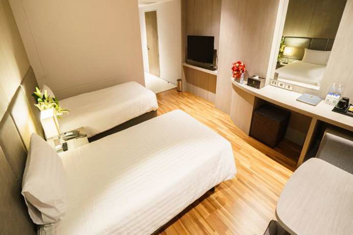 Imagen de la habitación del Hotel New Season Square. Foto 18