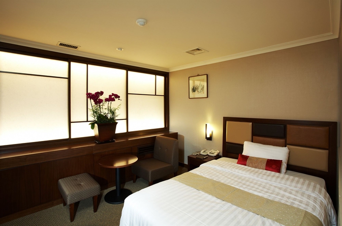 Imagen de la habitación del Hotel New Seoul. Foto 5