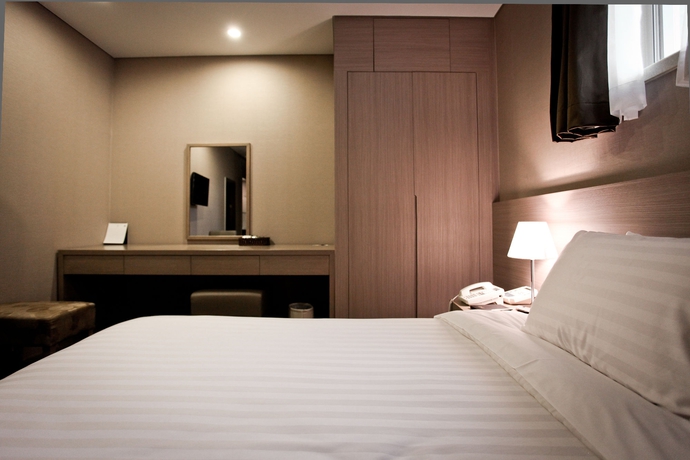 Imagen de la habitación del Hotel New Seoul. Foto 8