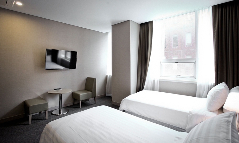 Imagen de la habitación del Hotel New Seoul. Foto 9