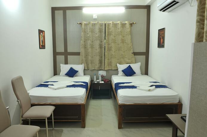 Imagen de la habitación del Hotel New Shiva. Foto 18