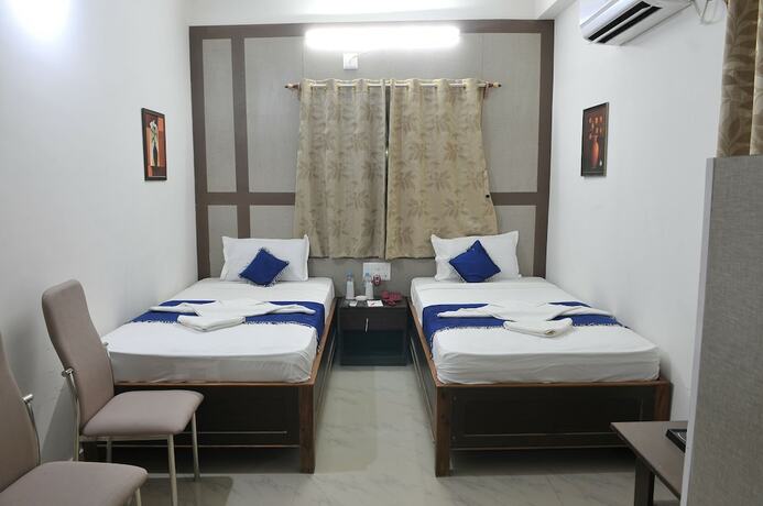 Imagen de la habitación del Hotel New Shiva. Foto 24