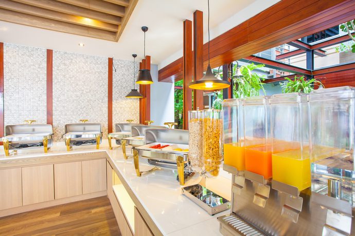 Imagen del bar/restaurante del Hotel New Siam Palace Ville. Foto 14