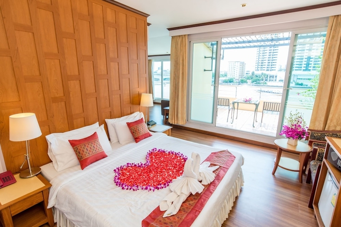 Imagen de la habitación del Hotel New Siam Riverside. Foto 11