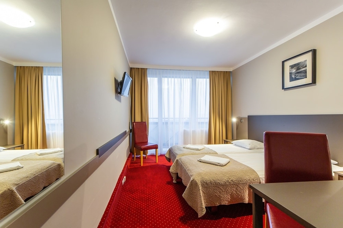 Imagen de la habitación del Hotel New Skanpol. Foto 5