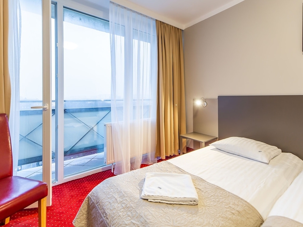 Imagen de la habitación del Hotel New Skanpol. Foto 11