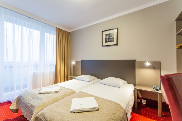 Imagen de la habitación del Hotel New Skanpol. Foto 12
