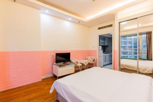 Imagen de la habitación del Hotel New Space New (zhongshan Park). Foto 5