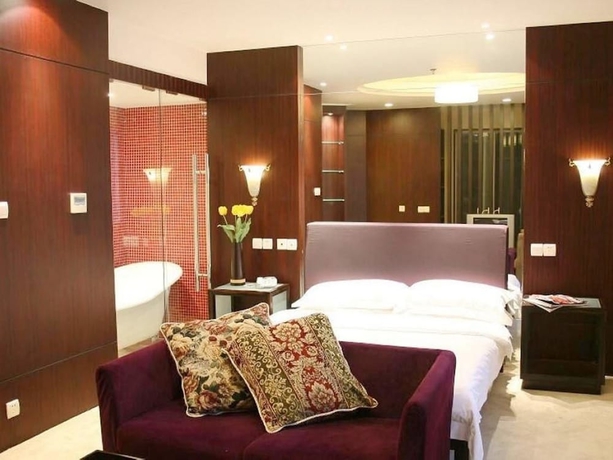 Imagen de la habitación del Hotel New Space - time Ruili Hotel. Foto 8