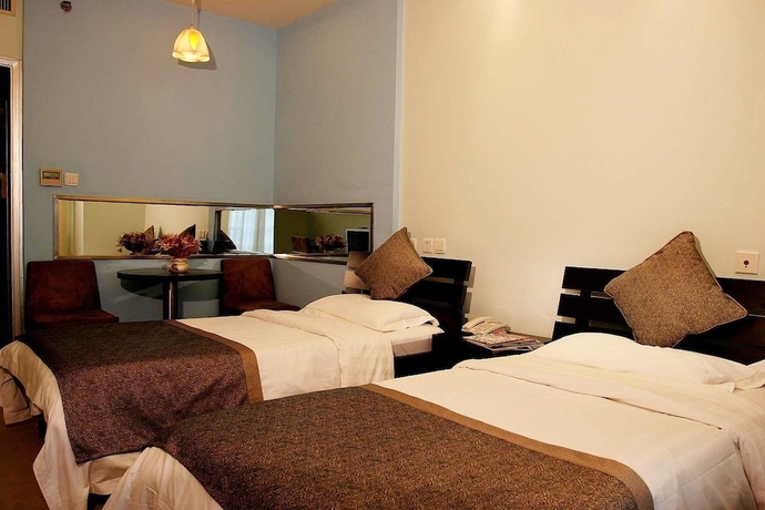 Imagen de la habitación del Hotel New Space - time Ruili Hotel. Foto 10
