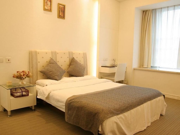 Imagen de la habitación del Hotel New Space - time Ruili Hotel. Foto 13