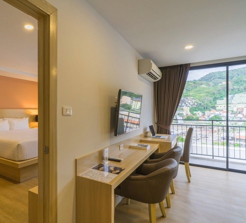 Imagen de la habitación del Hotel New Square Patong Hotel. Foto 12