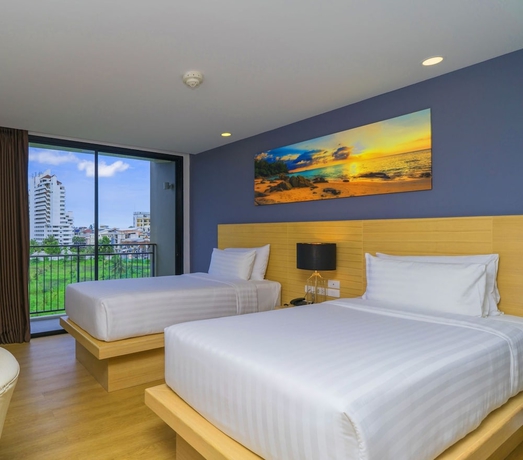 Imagen de la habitación del Hotel New Square Patong Hotel. Foto 15