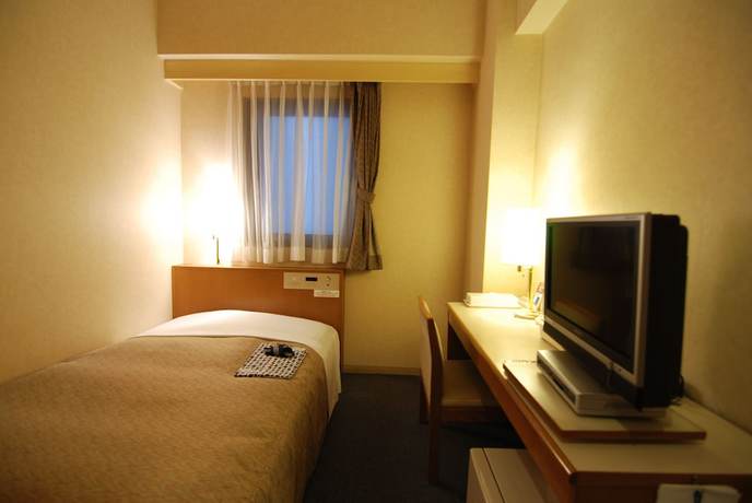 Imagen de la habitación del Hotel New Star Ikebukuro. Foto 4