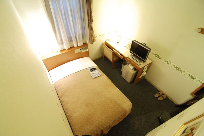 Imagen de la habitación del Hotel New Star Ikebukuro. Foto 6