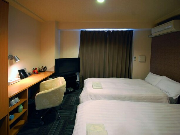 Imagen de la habitación del Hotel New Station, Isahaya. Foto 9