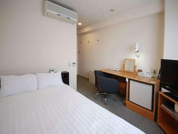 Imagen de la habitación del Hotel New Station, Isahaya. Foto 10