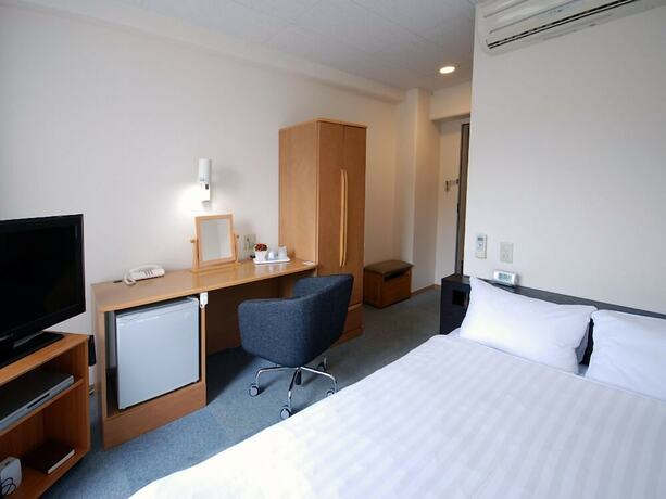 Imagen de la habitación del Hotel New Station, Isahaya. Foto 11