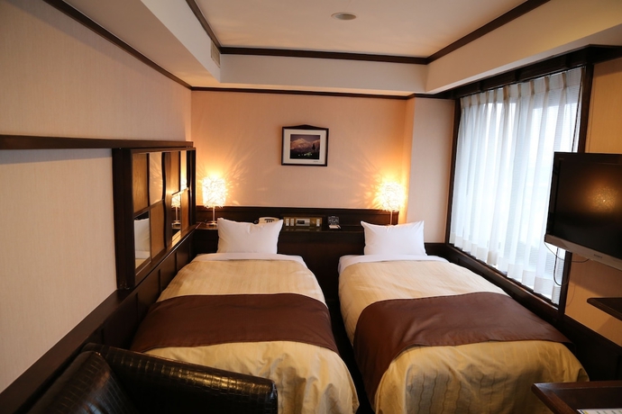 Imagen de la habitación del Hotel New Station, Matsumoto. Foto 3