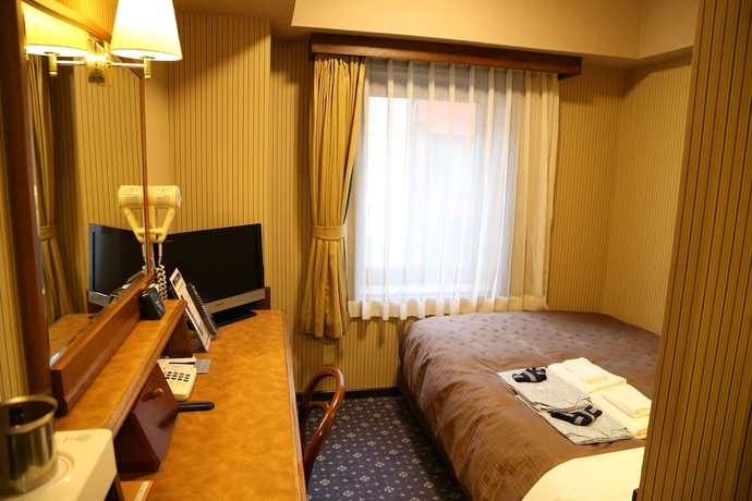 Imagen de la habitación del Hotel New Station, Matsumoto. Foto 4