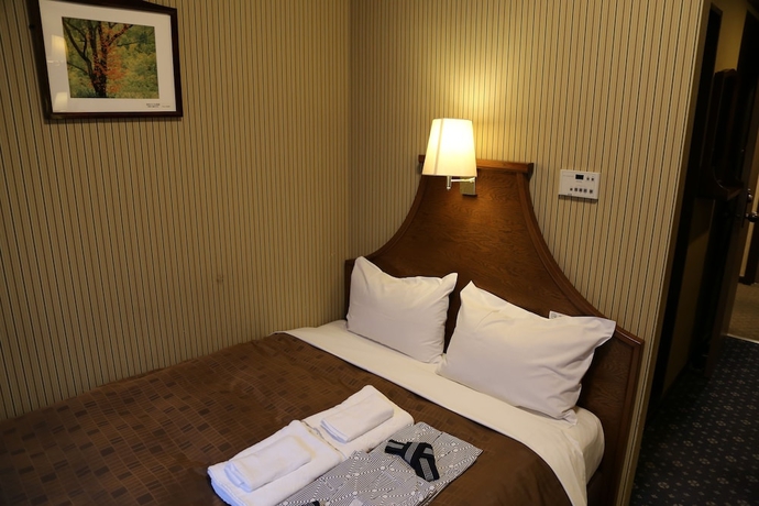 Imagen de la habitación del Hotel New Station, Matsumoto. Foto 5