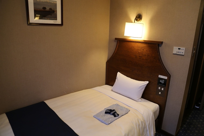 Imagen de la habitación del Hotel New Station, Matsumoto. Foto 6