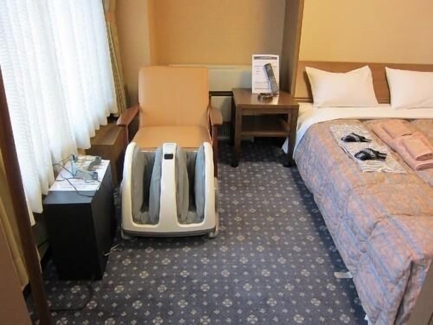 Imagen de la habitación del Hotel New Station, Matsumoto. Foto 14