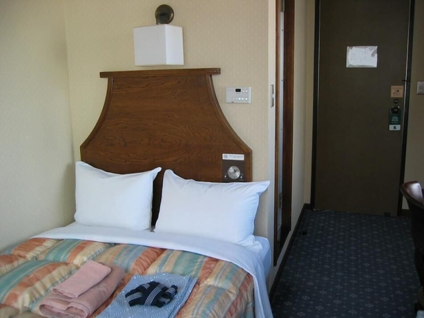 Imagen de la habitación del Hotel New Station, Matsumoto. Foto 16