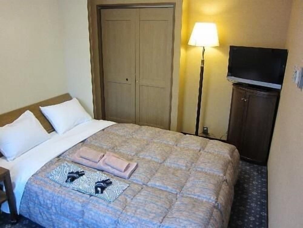 Imagen de la habitación del Hotel New Station, Matsumoto. Foto 17