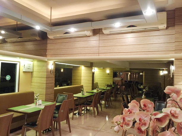 Imagen del bar/restaurante del Hotel New Suanmali. Foto 5