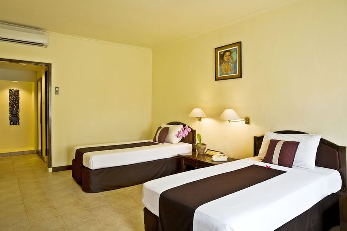 Imagen de la habitación del Hotel New Sunari Lovina Beach Resort. Foto 9