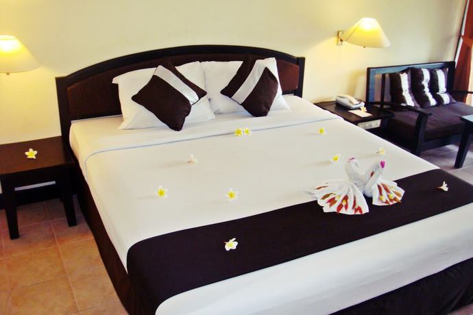 Imagen de la habitación del Hotel New Sunari Lovina Beach Resort. Foto 10