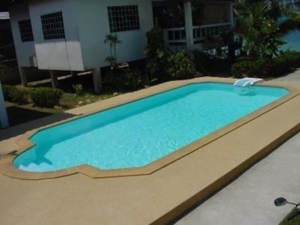 Imagen de la piscina del Hotel New Sunrise Village Bang Po Beach. Foto 14