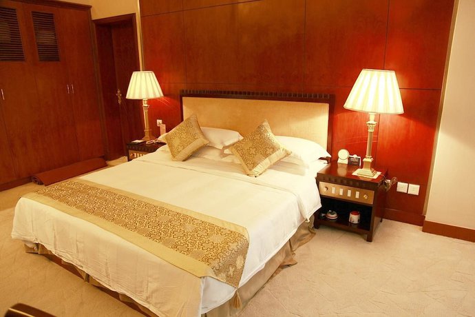 Imagen de la habitación del Hotel New Tai Garden Hotel. Foto 4