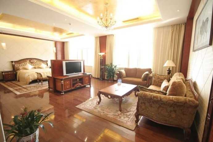 Imagen de la habitación del Hotel New Tai Garden Hotel. Foto 6