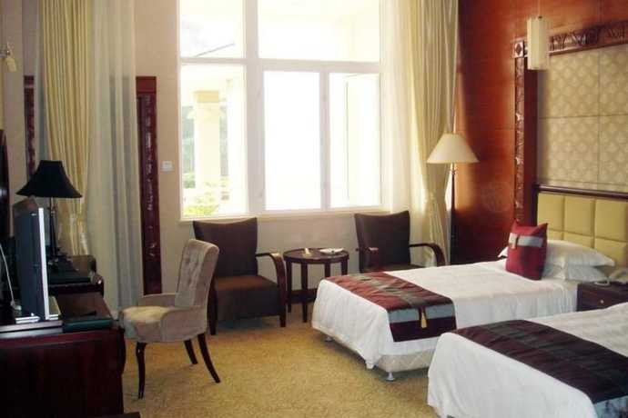 Imagen de la habitación del Hotel New Tai Garden Hotel. Foto 10