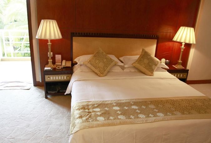 Imagen de la habitación del Hotel New Tai Garden Hotel. Foto 13