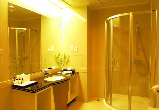 Imagen de la habitación del Hotel New Tai Garden Hotel. Foto 17