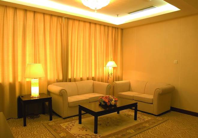 Imagen de la habitación del Hotel New Tai Garden Hotel. Foto 18